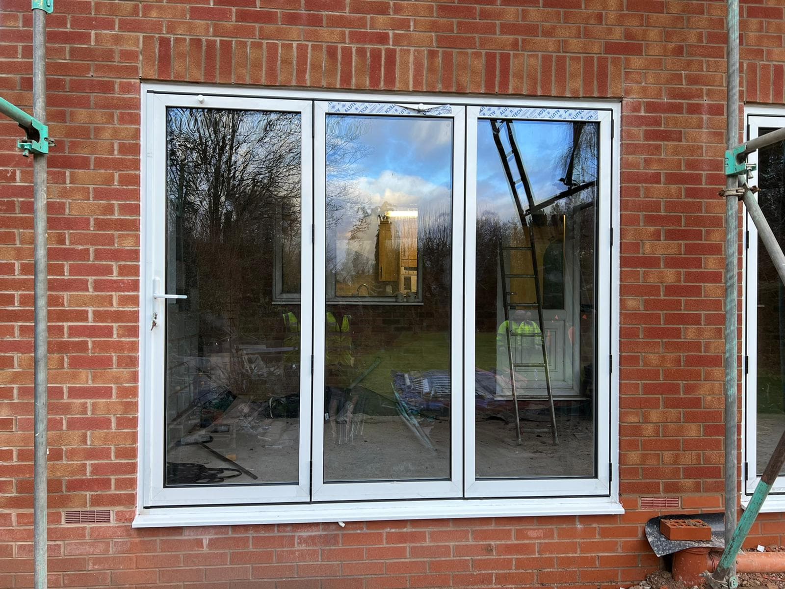 Integrated roller shutter shopfront installation